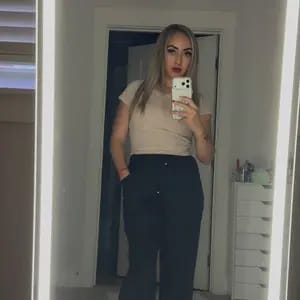 Customer photo review of Lace-up Trousers Loose-fit Drawstring Wide-leg Pants With Multiple Pockets