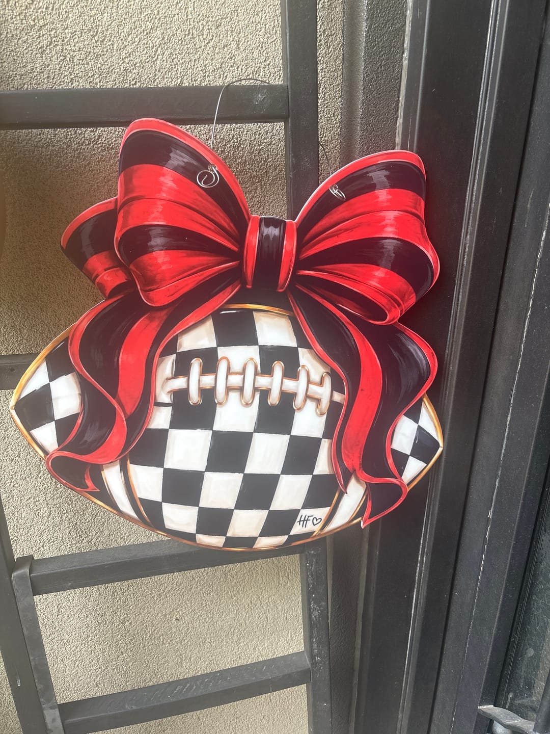 Customer photo review of Checkered Football Bows Red Black Door Hanger