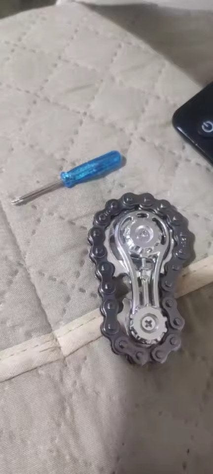 Customer photo review of Fahrradketten Finger Spinner Zappelspielzeug | Leise Fokushilfe Kinder Zahnrad Design
