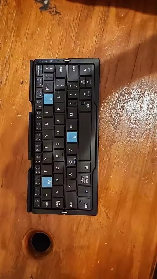 Customer photo review of AA OOS TypeNest™ Foldable Bluetooth Keyboard with Stand — Pairs 3 Devices