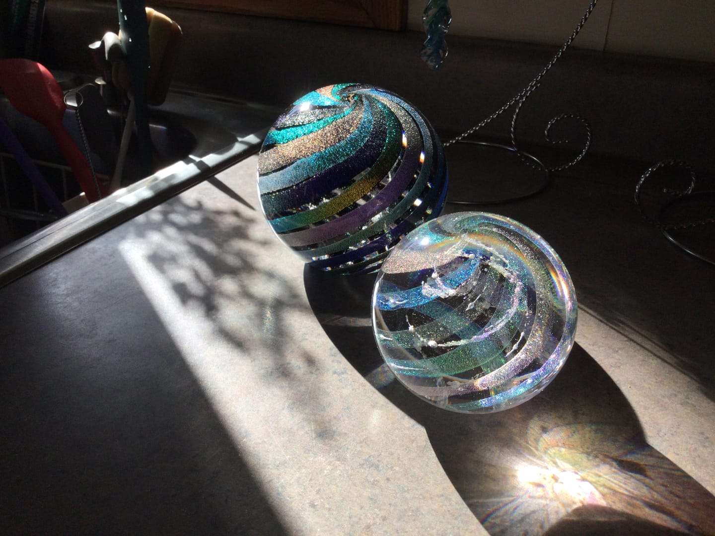 Customer photo review of Illuminated Dichroic Rainbow Orb with Cremains