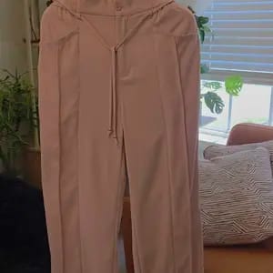 Customer photo review of Lace-up Trousers Loose-fit Drawstring Wide-leg Pants With Multiple Pockets