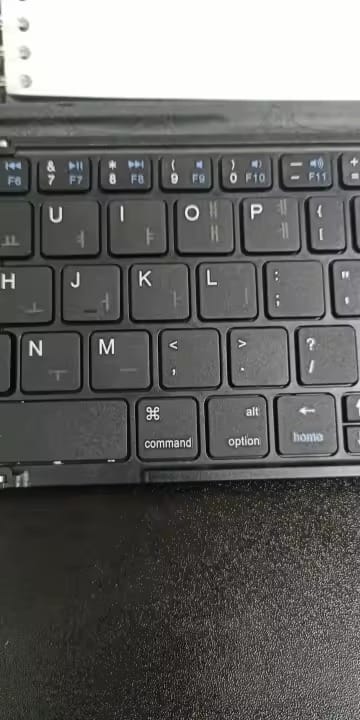 Customer photo review of AA OOS TypeNest™ Foldable Bluetooth Keyboard with Stand — Pairs 3 Devices