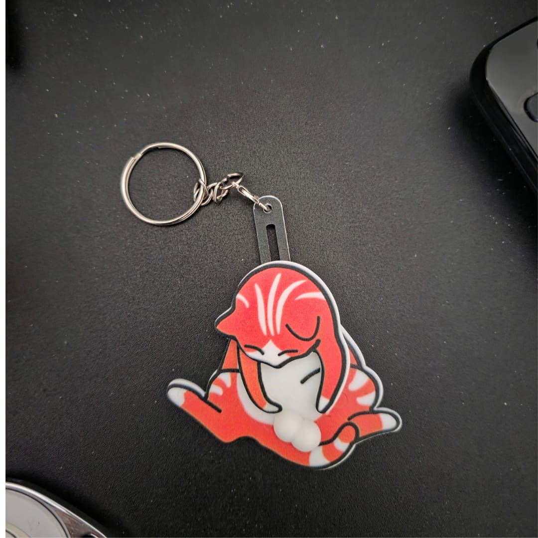 Customer photo review of Mischief Cat - Interactuve Cat Keychain