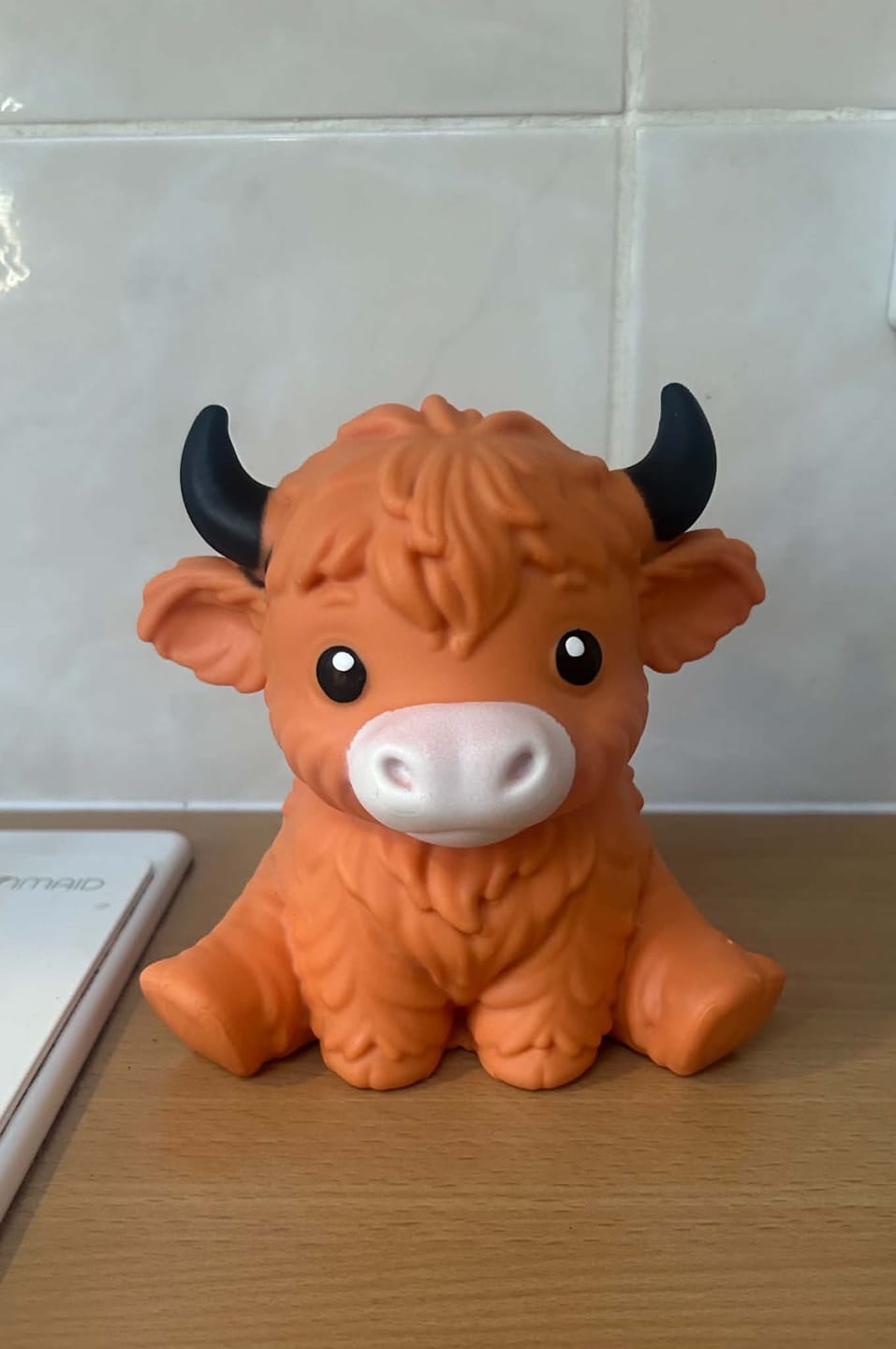Customer photo review of Giant Durable Squishy Highland Cow