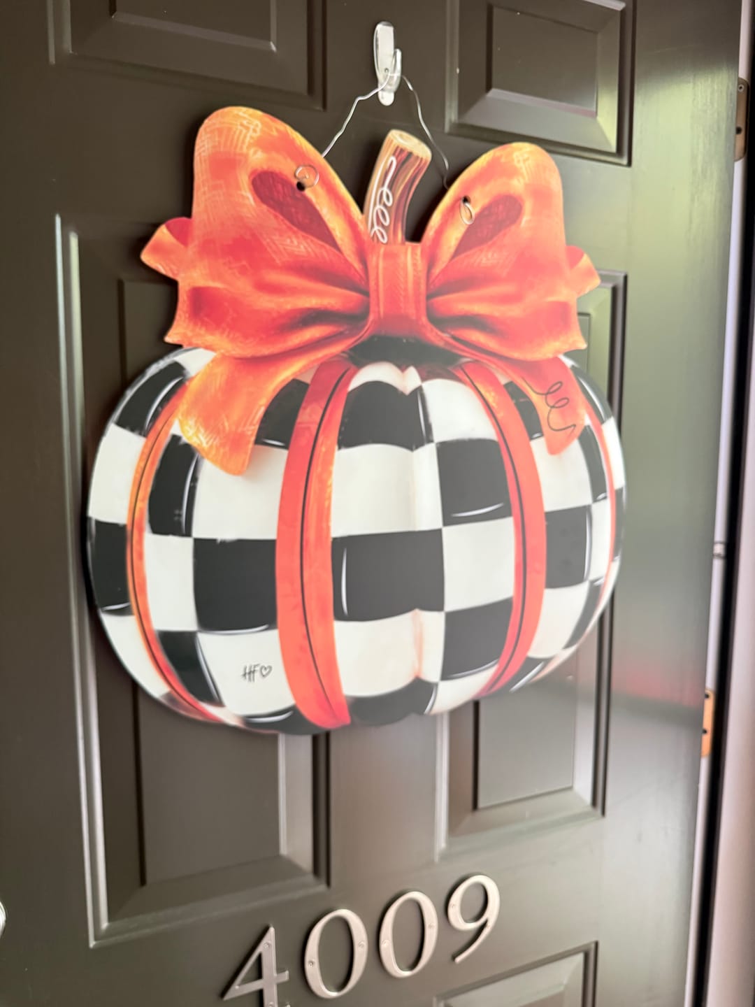 Customer photo review of Elegant Checkered Pumpkin Door Hanger