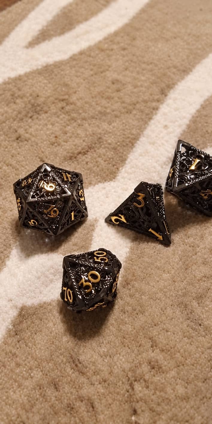Customer photo review of Abyssal Hollow Metal Dice