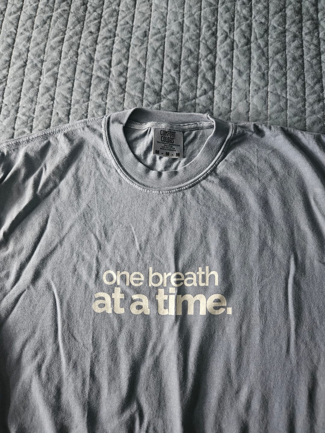 Customer photo review of My Mama Said™ “One breath at a time” Unisex Comfort Tee — Quiet Strength, Minimalist Text Shirt