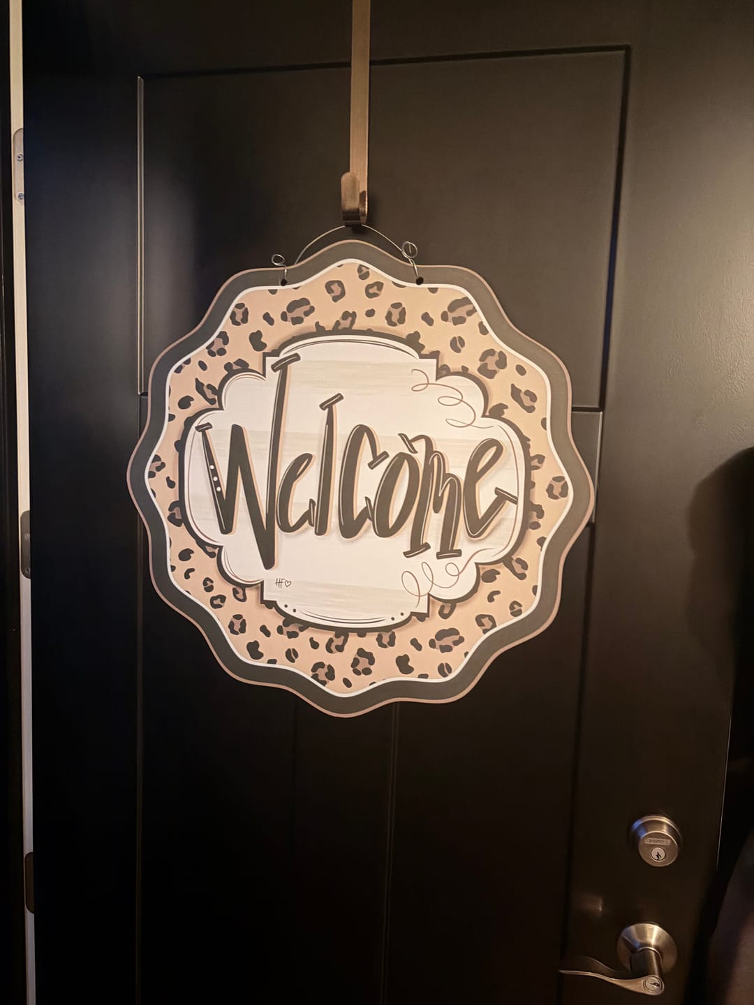 Customer photo review of Leopard Cheetah Welcome Door Hanger