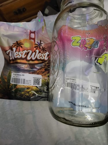 Customer's West West Brand Fruity Pebbles OG bag next to an empty glass jar