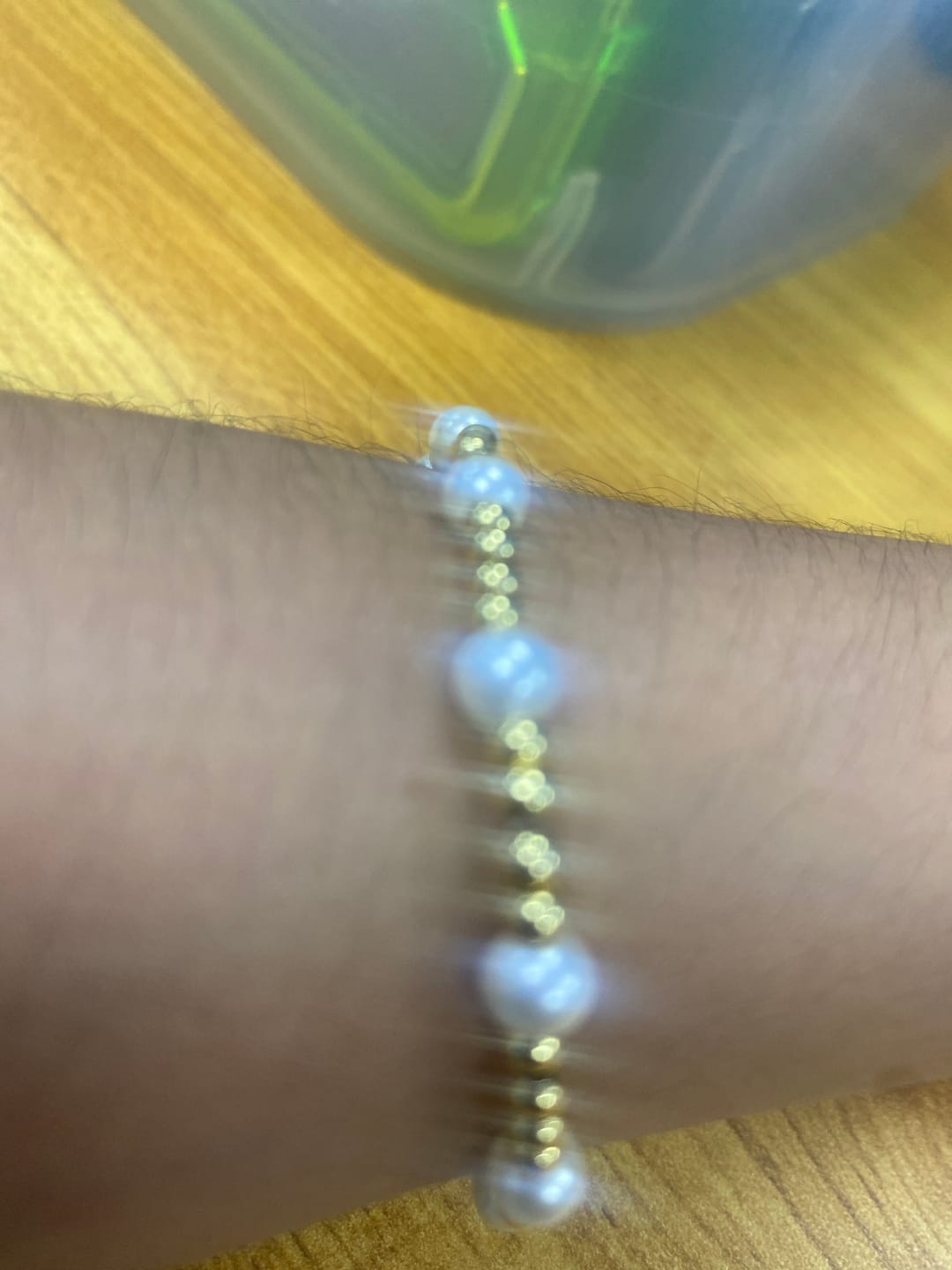 Customer photo review of Pulsera Bolitas Doradas Con Perlitas