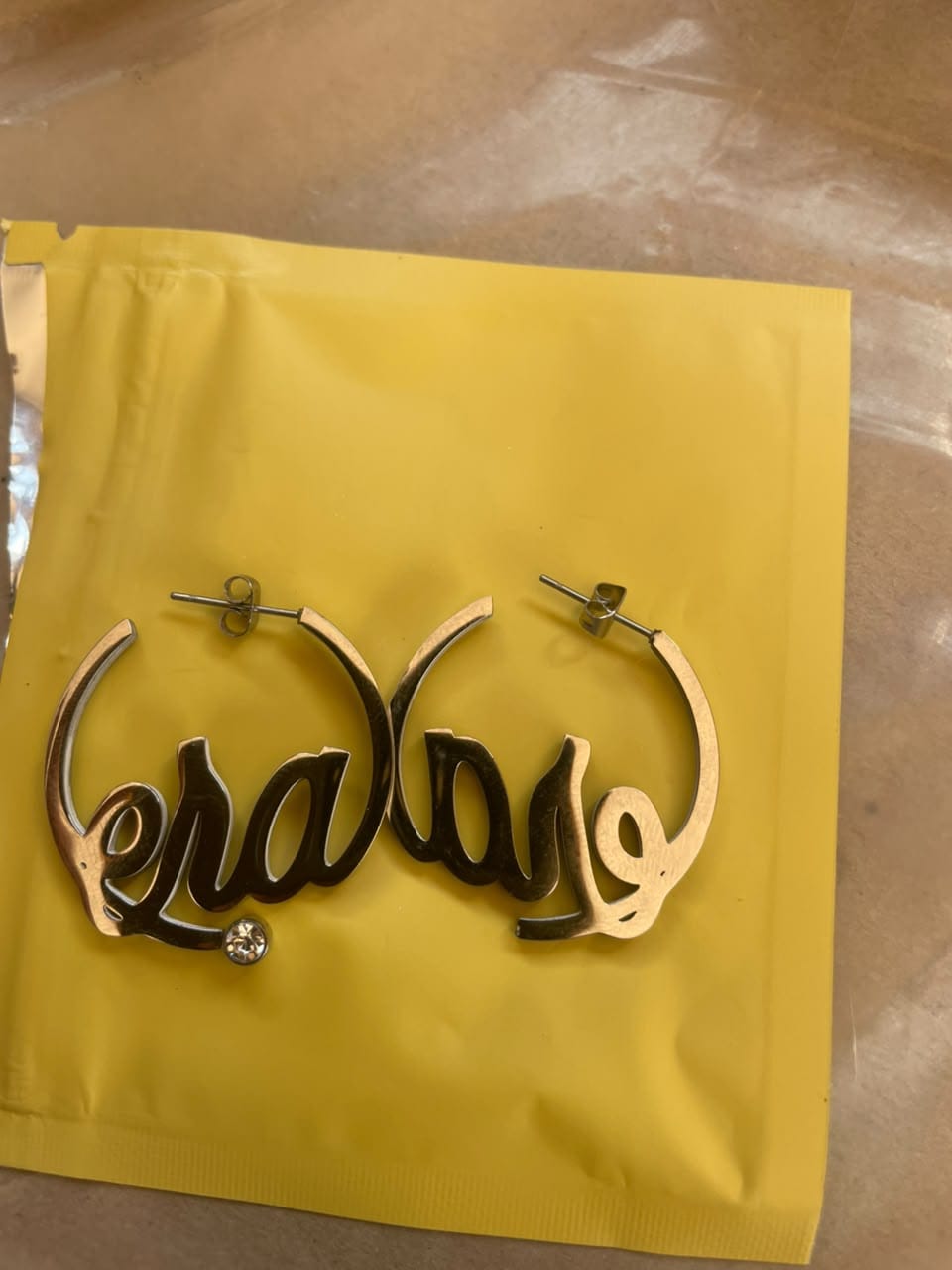 Customer photo review of Silver Era Logo Mini Hoops