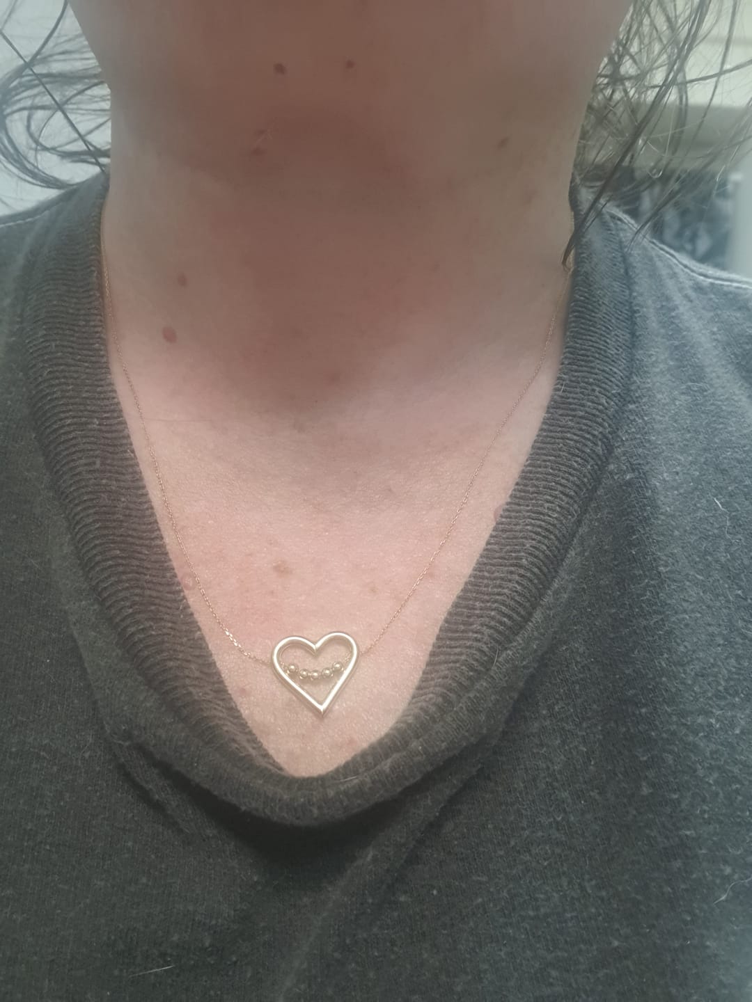 Customer photo review of Gold Essentials Pierced Heart Necklace