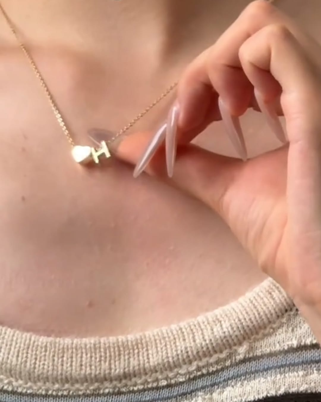 Customer photo review of Heart Initial Necklace