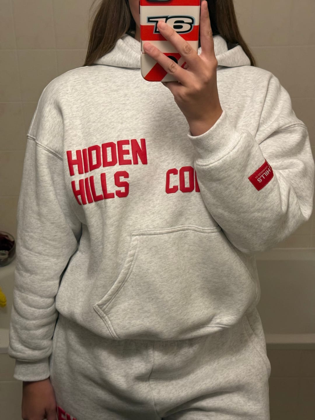 Customer photo review of GATED COMMUNITY HOODIE LIGHT GREY/RED