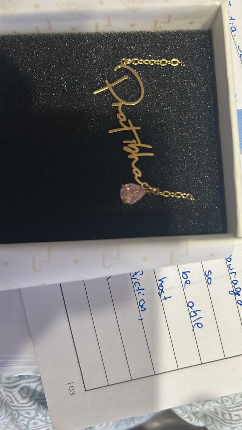Customer photo review of Lucce Signature Necklace