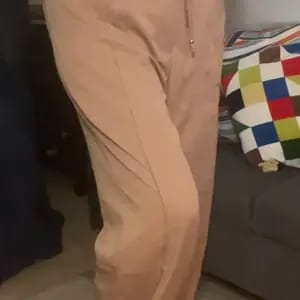 Customer photo review of Lace-up Trousers Loose-fit Drawstring Wide-leg Pants With Multiple Pockets