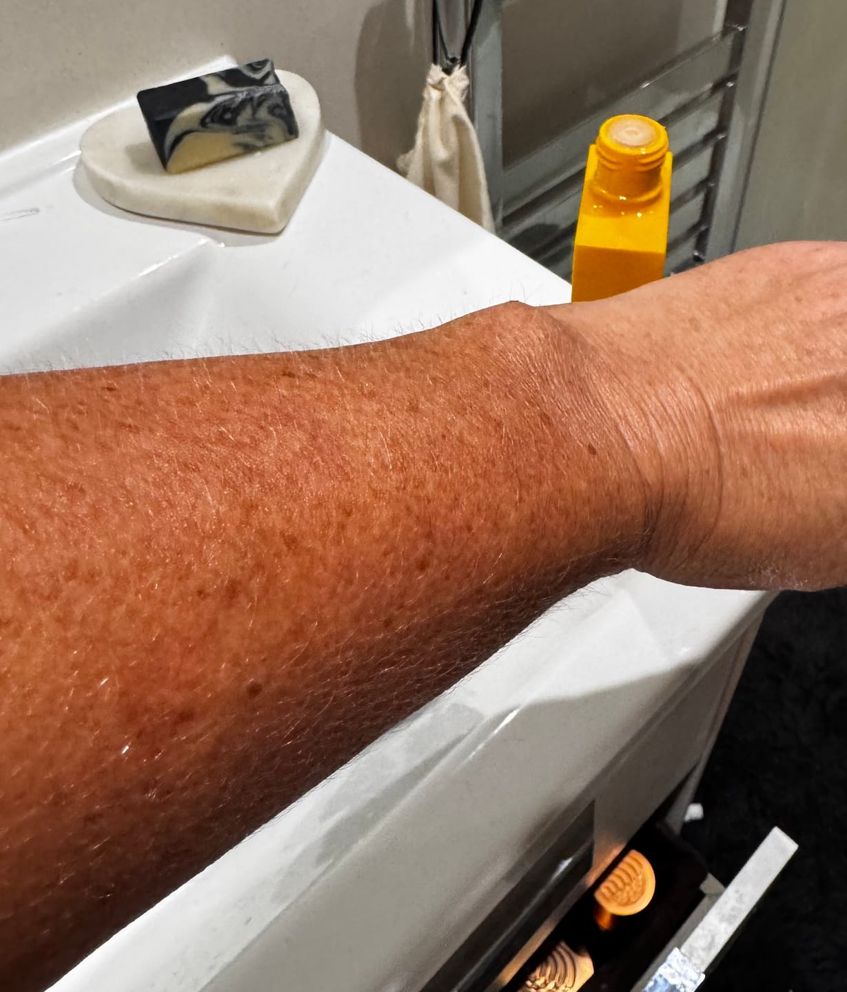 Customer photo review of Tan Boosting Duo - Sun Tanning Oil + Lotion