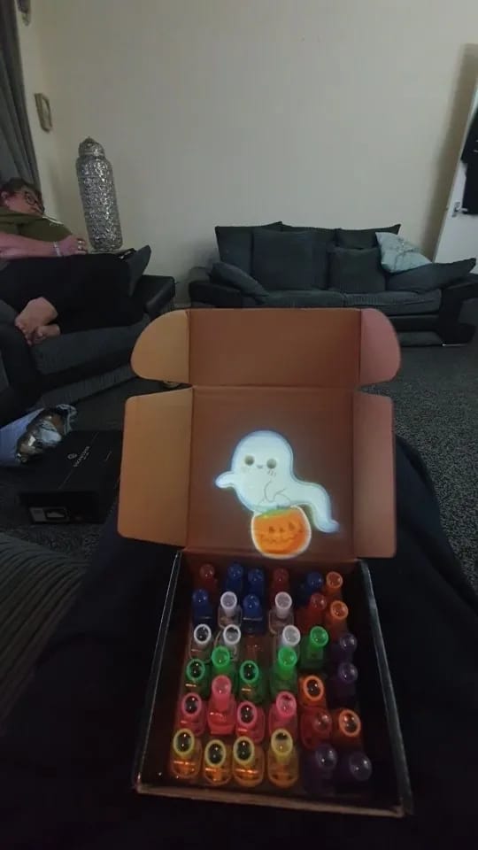 Customer photo review of 36-Piece Halloween LED Finger Lights – Neon Glow Party Favors (Boxed Set)