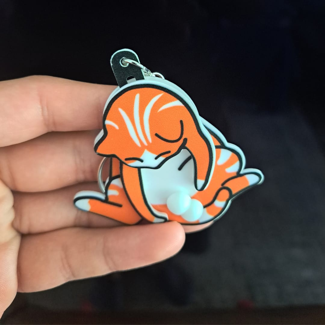 Customer photo review of Mischief Cat - Interactuve Cat Keychain
