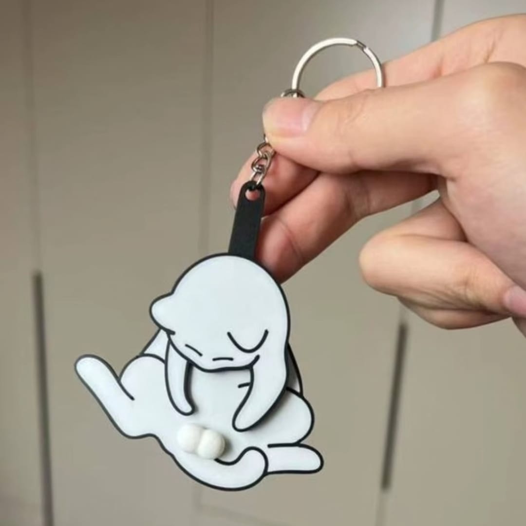 Customer photo review of Mischief Cat - Interactuve Cat Keychain