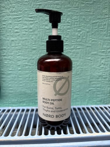 Customer photo review of NØRD BODY Peptide Body Oil