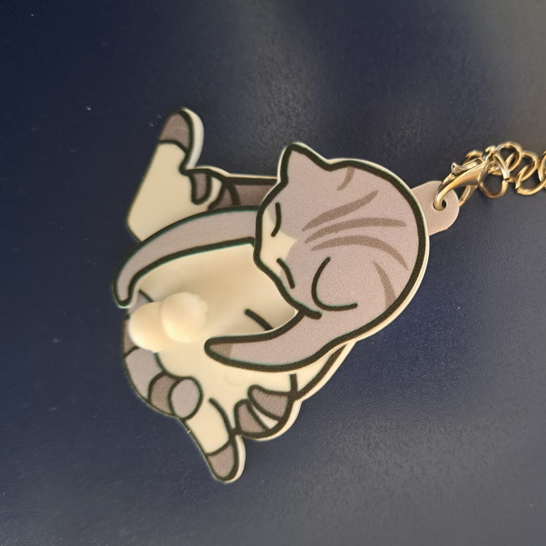 Customer photo review of Mischief Cat - Interactuve Cat Keychain