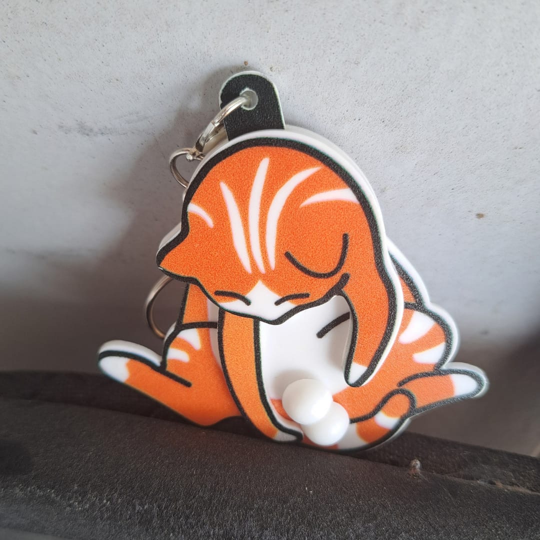Customer photo review of Mischief Cat - Interactuve Cat Keychain