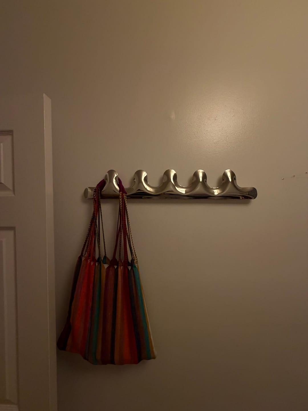 Customer photo review of Chrome Puffy Wall Hanger - 5 Coat Hanger
