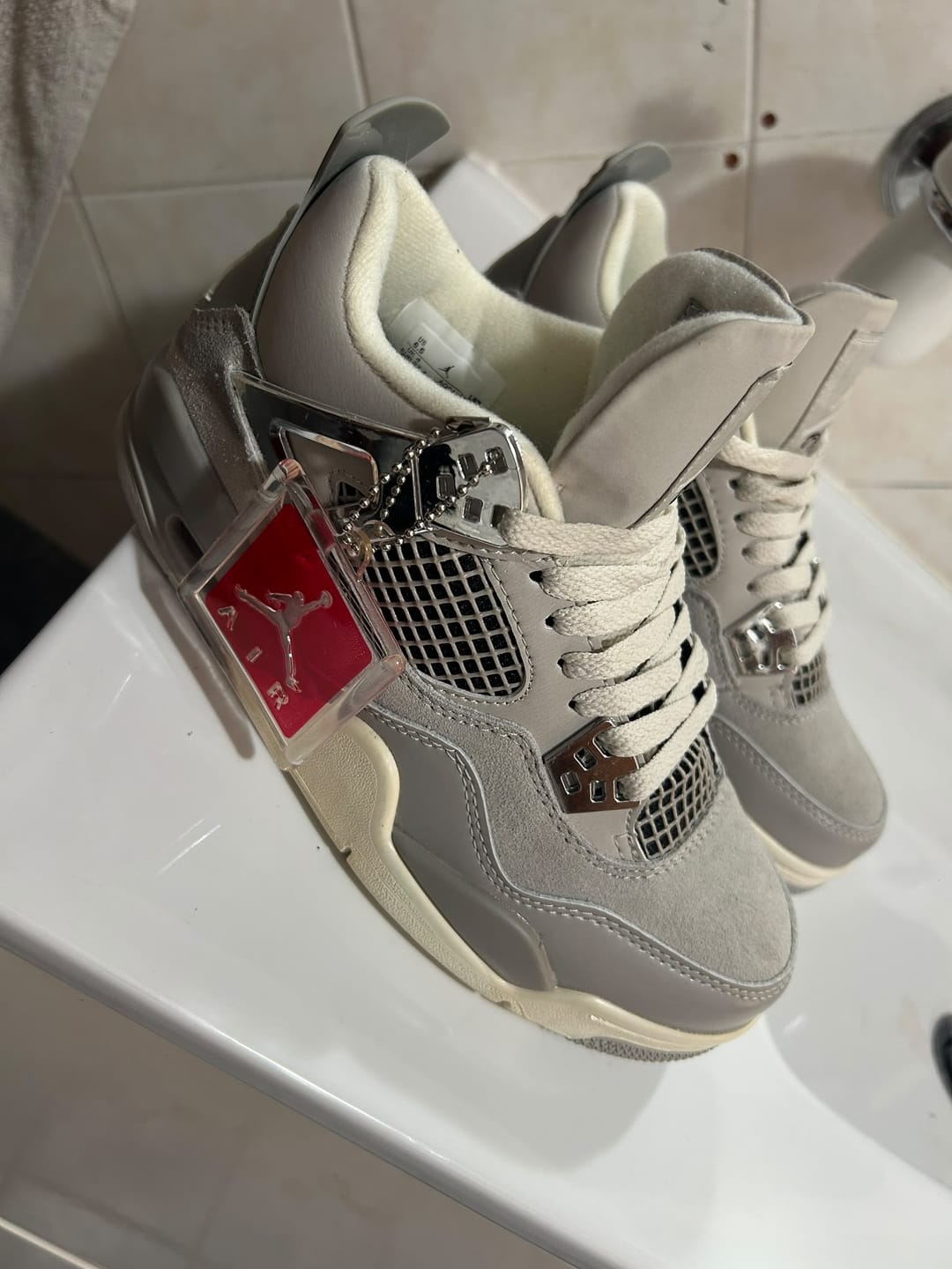 Customer photo review of Nike Air Jordan 4 Retro Frozen Moments