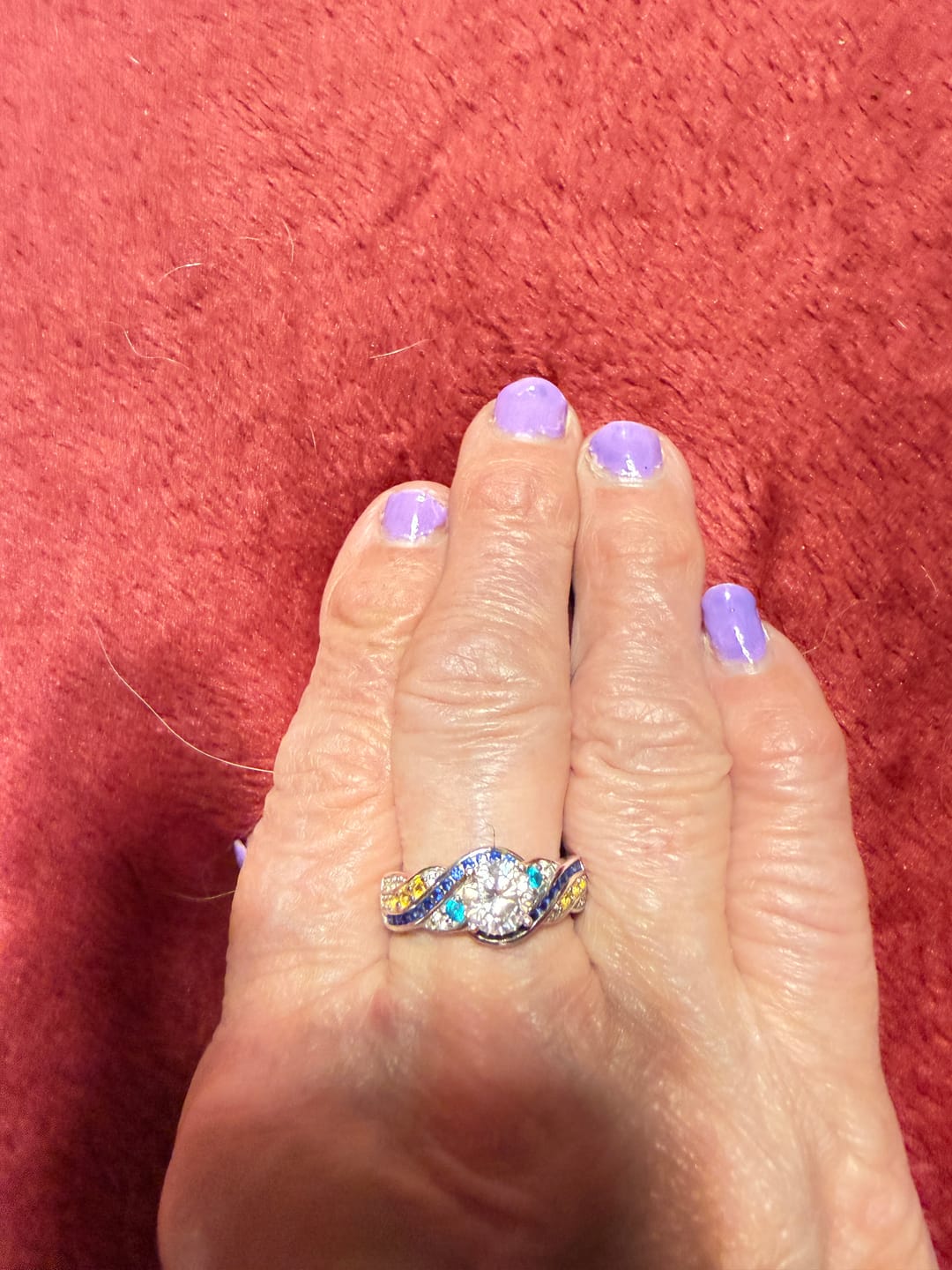 Customer photo review of Starry Night Moissanite Artistic Swirl Accent Engagement Ring