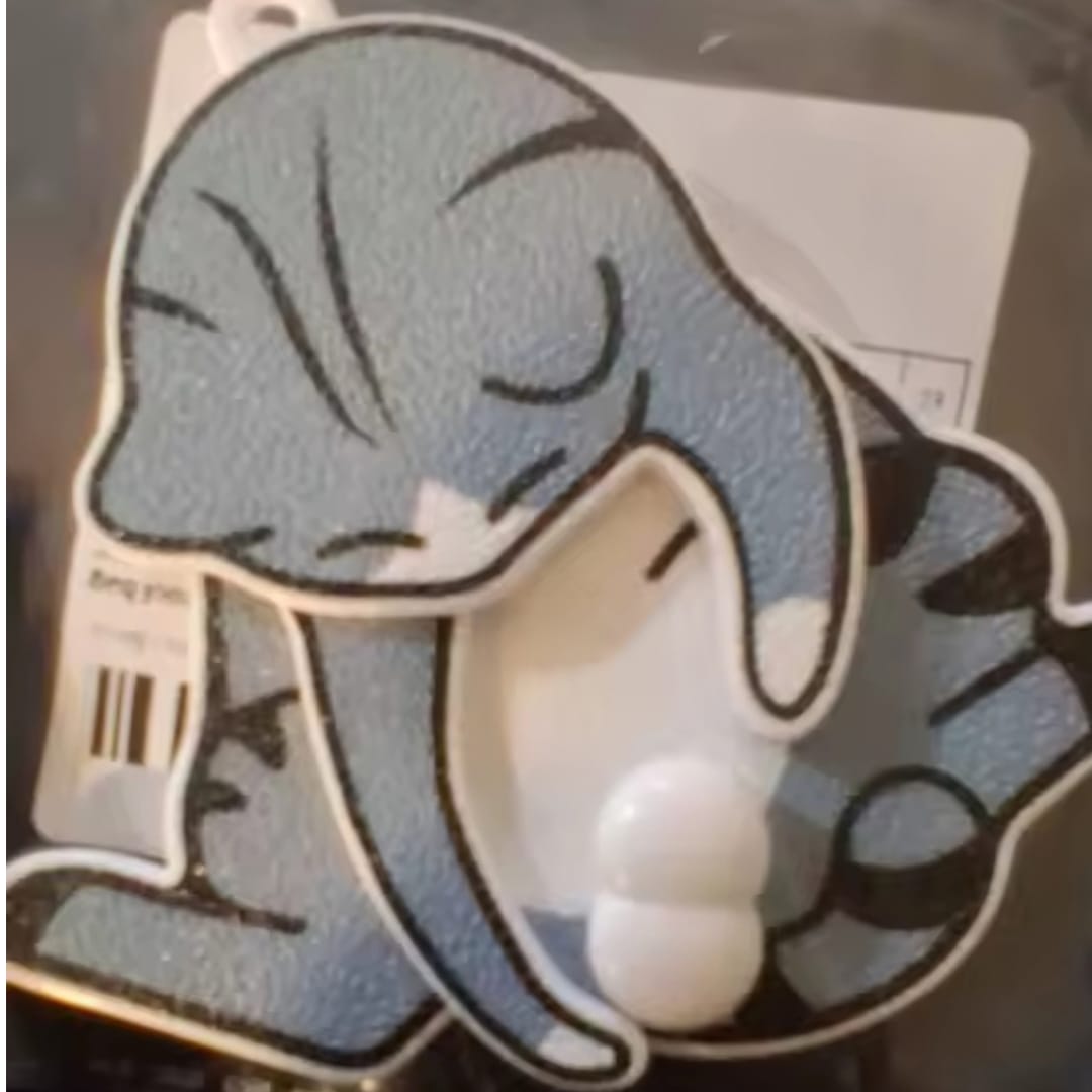 Customer photo review of Mischief Cat - Interactuve Cat Keychain