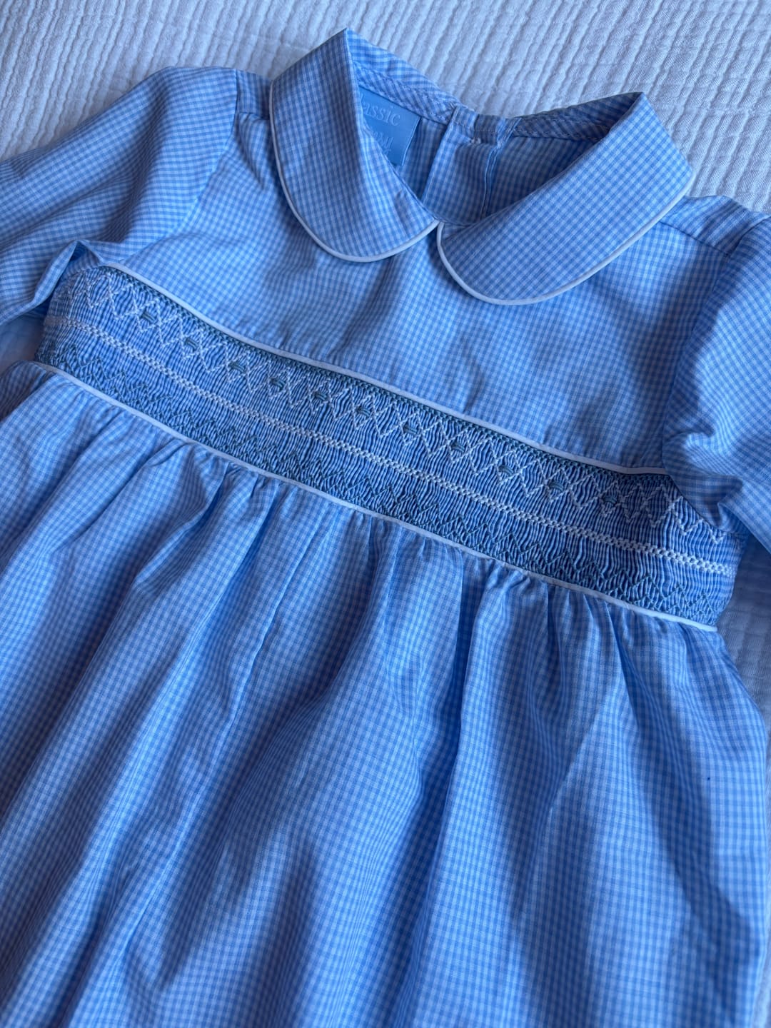 Customer photo review of Light Blue Geo Smocked Gingham Romper