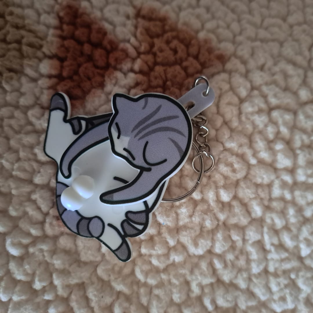 Customer photo review of Mischief Cat - Interactuve Cat Keychain