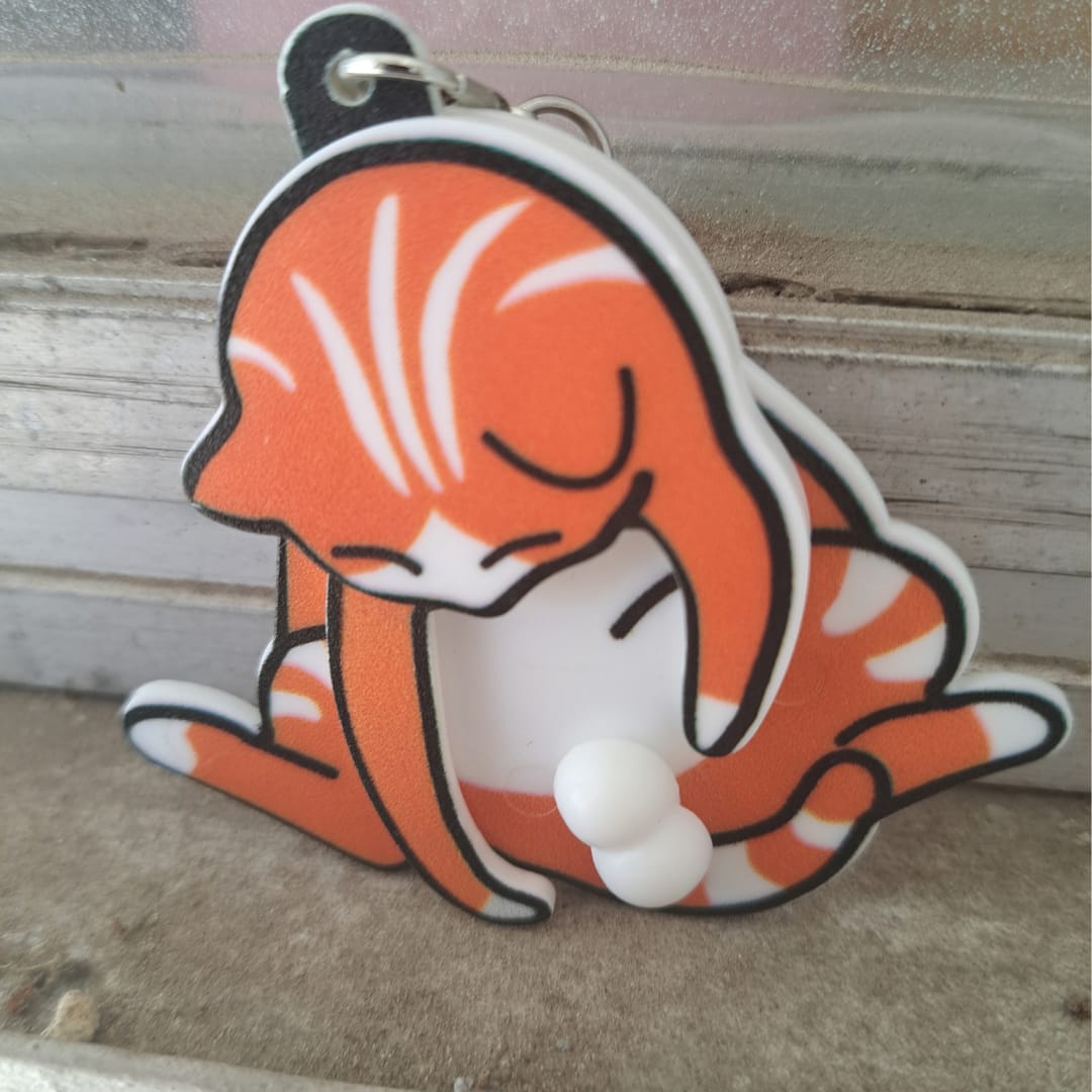 Customer photo review of Mischief Cat - Interactuve Cat Keychain