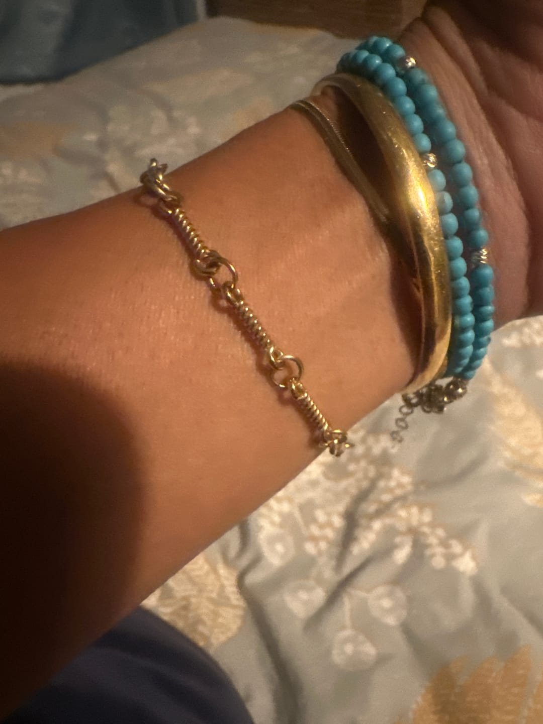 Customer photo review of Figaro Gold Knot Chain Bracelet