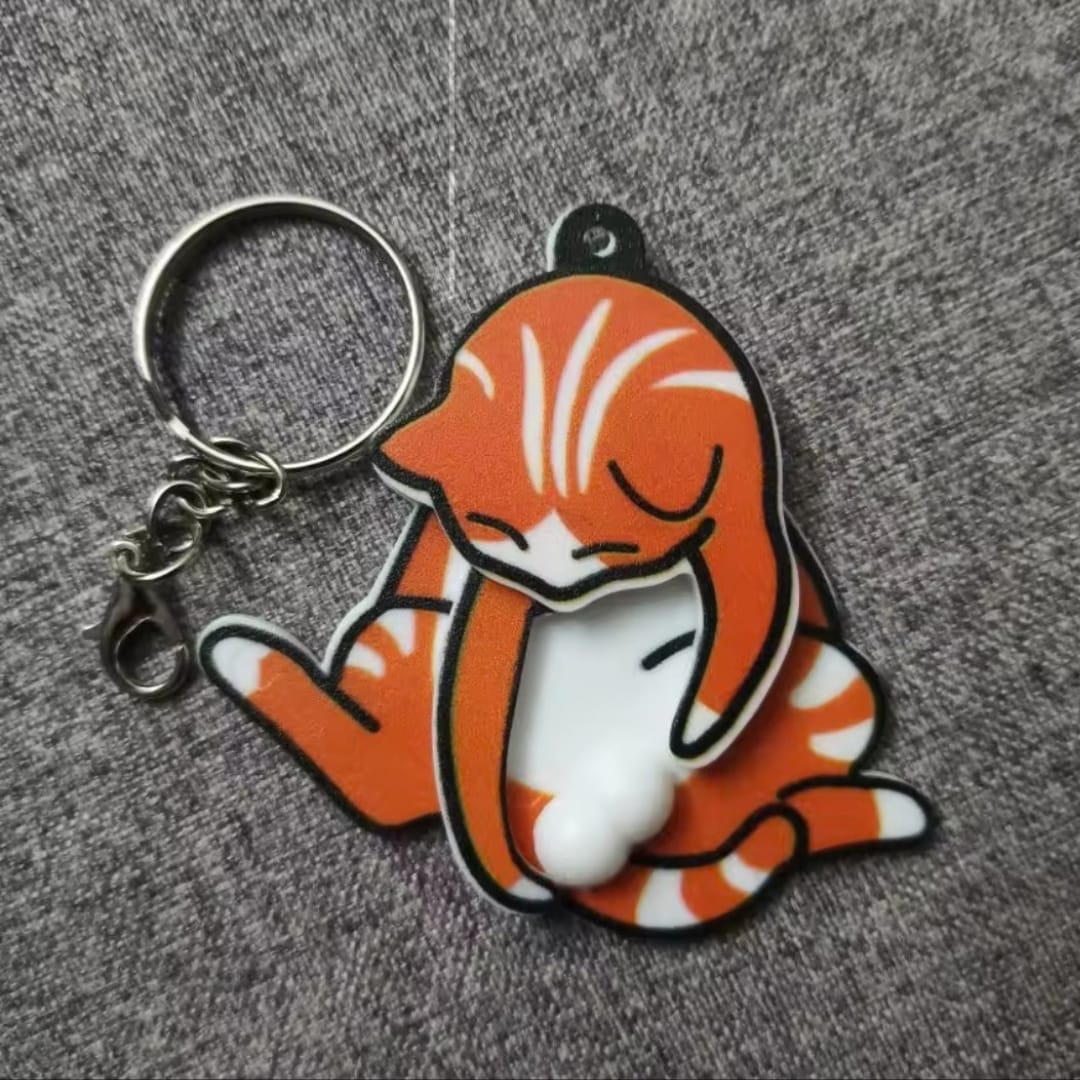 Customer photo review of Mischief Cat - Interactuve Cat Keychain