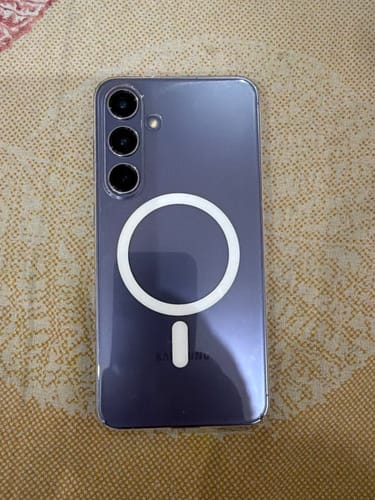 Customer's Anti Yellow MagSafe clear case on a dark phone showing the circular white magnetic ring
