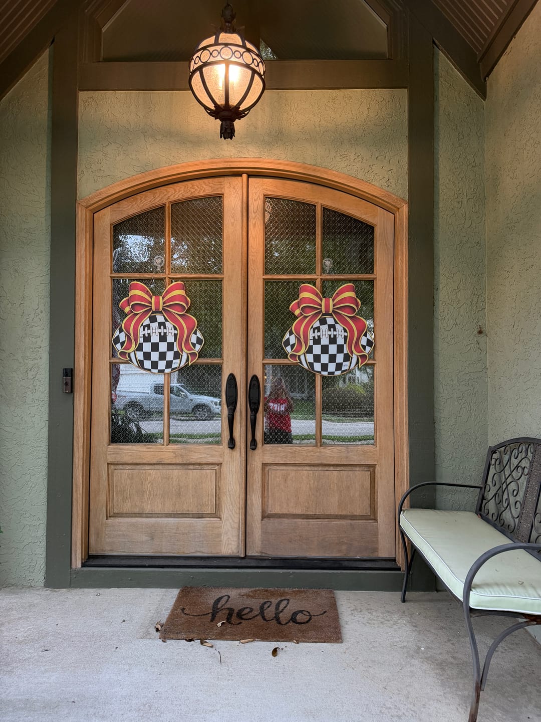 Customer photo review of Checkered Football Bows Red Yellow Door Hanger