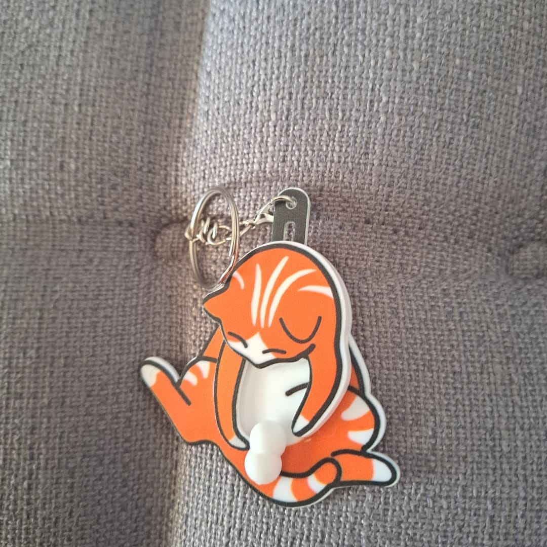 Customer photo review of Mischief Cat - Interactuve Cat Keychain