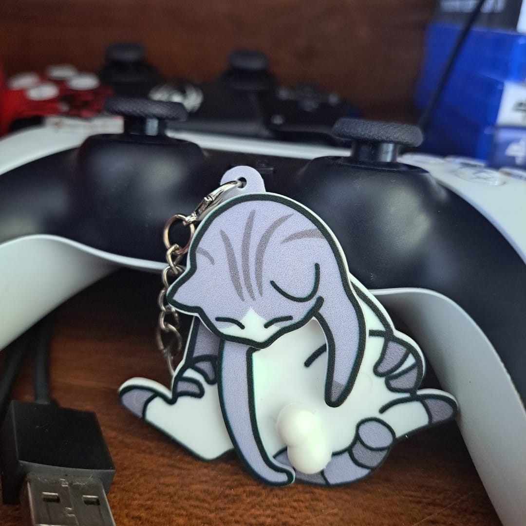 Customer photo review of Mischief Cat - Interactuve Cat Keychain