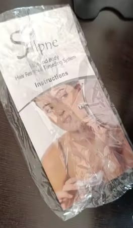Customer photo review of Depilador facial con hilo