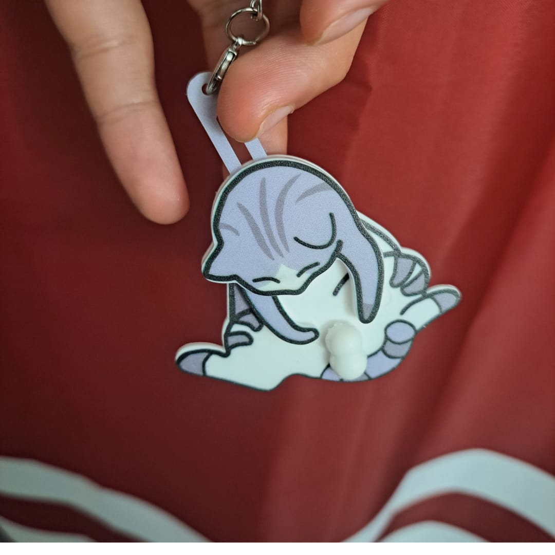 Customer photo review of Mischief Cat - Interactuve Cat Keychain