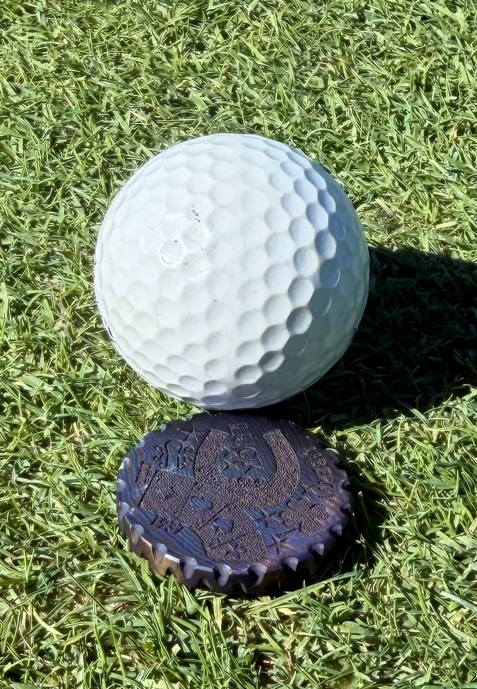Customer photo review of HOBO LUCK GOLF BALL MARKER - TIMASCUS EDITION