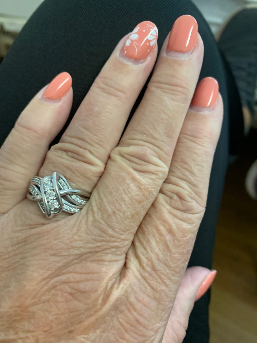 Customer photo review of Swirl Interlocking Criss-Cross Moissanite Wedding Band Ring