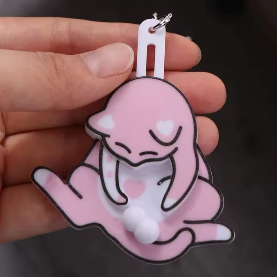 Customer photo review of Mischief Cat - Interactuve Cat Keychain