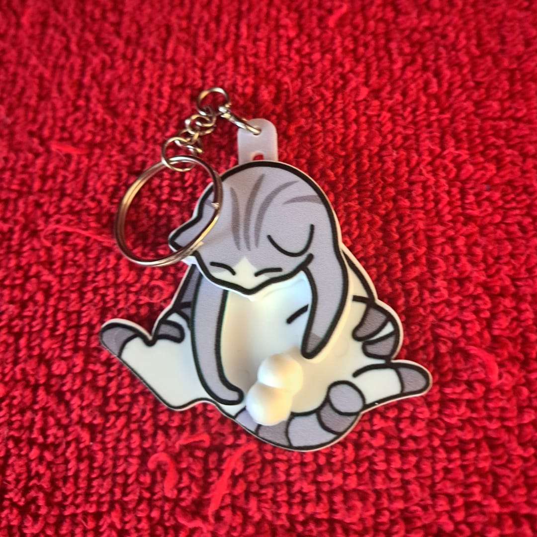 Customer photo review of Mischief Cat - Interactuve Cat Keychain