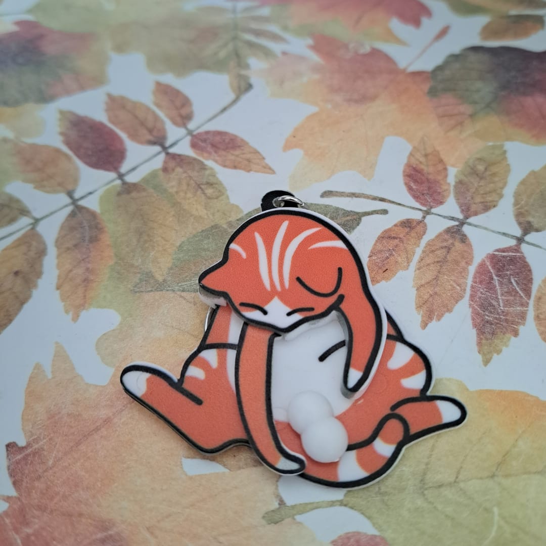Customer photo review of Mischief Cat - Interactuve Cat Keychain