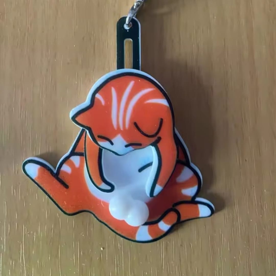 Customer photo review of Mischief Cat - Interactuve Cat Keychain