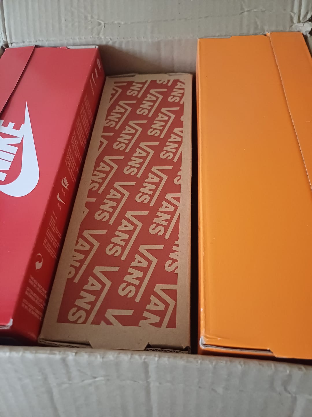 Customer photo review of Tenis Travis Low OG Mocha